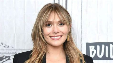 Elizabeth Olsen Body Measurements Bra Size Height。